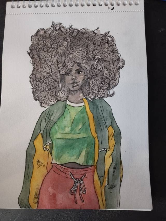 Ink and watercolor of a woman with large curly hair in a green crop top, yellow jacket and red trousers, on a spiral sketchbook.