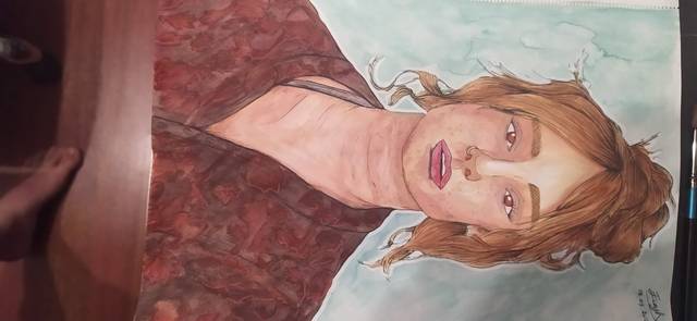 Watercolor portrait of a person with long auburn hair against a dark red patterned background.